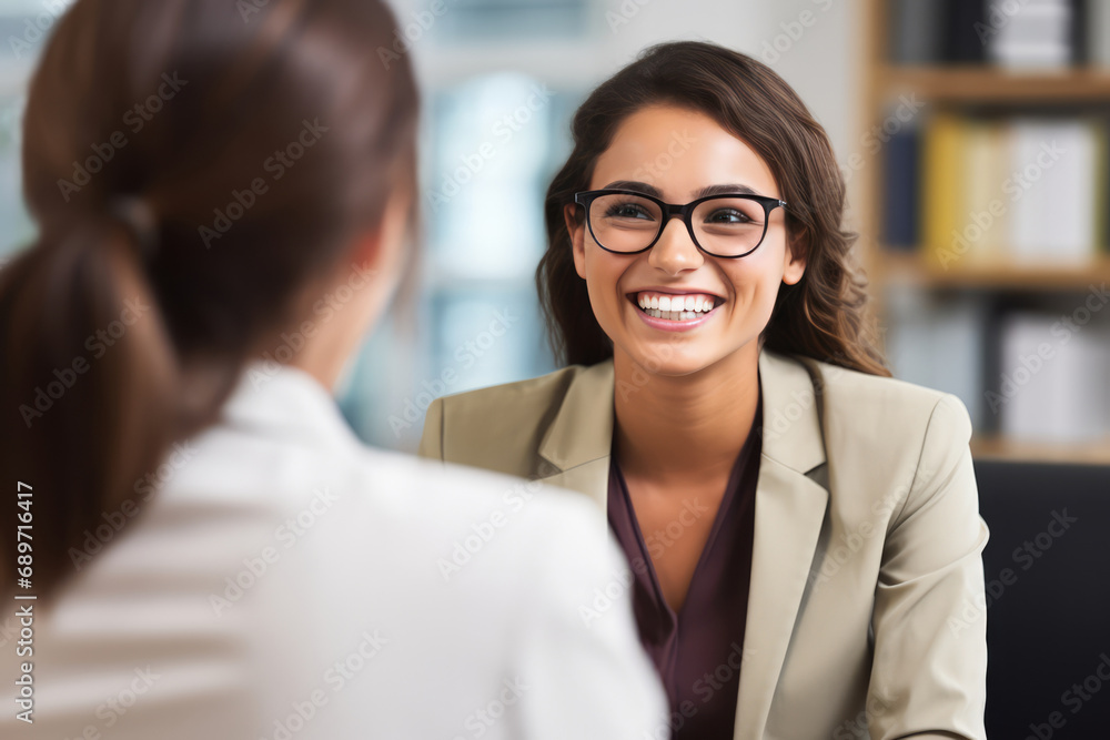 Woman Smiling In Job Interview With Hr Manager Woman Smiling In Job Interview With Hr Manager