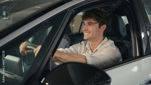 Happy smiling customer Caucasian business man sitting inside new car smile client buyer male driver owner guy in luxury vehicle in automobile salon store auto rent transport buying take bunch of key