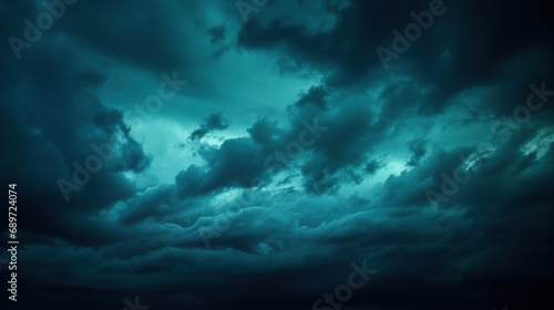 Dark teal cloudy sky. Night skies with clouds. Gloomy sky background for design.