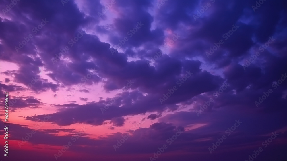 Obraz premium Deep purple magenta violet navy blue sky. Dramatic evening sky with clouds. Colorful sunset background for design. Dark shades. Cloudy weather. Storm. Fantasy fantastic.