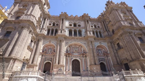 Facade of spectacular cathedral of Malaga. Situated in old town center, The Cathedral of Málaga is a Roman Catholic church,  constructed between 1528 and 1782, in the Renaissance architectural style.