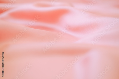 Stylish bright orange fabric stripes, blurred background