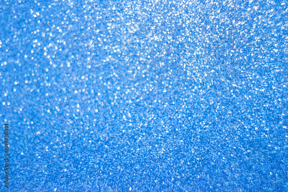 Blue bokeh. Defocused abstract blue background, holiday concept