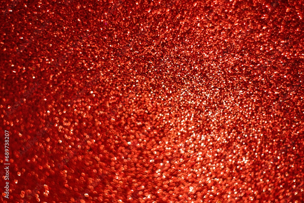 Red bokeh. Defocused abstract red background, holiday concept