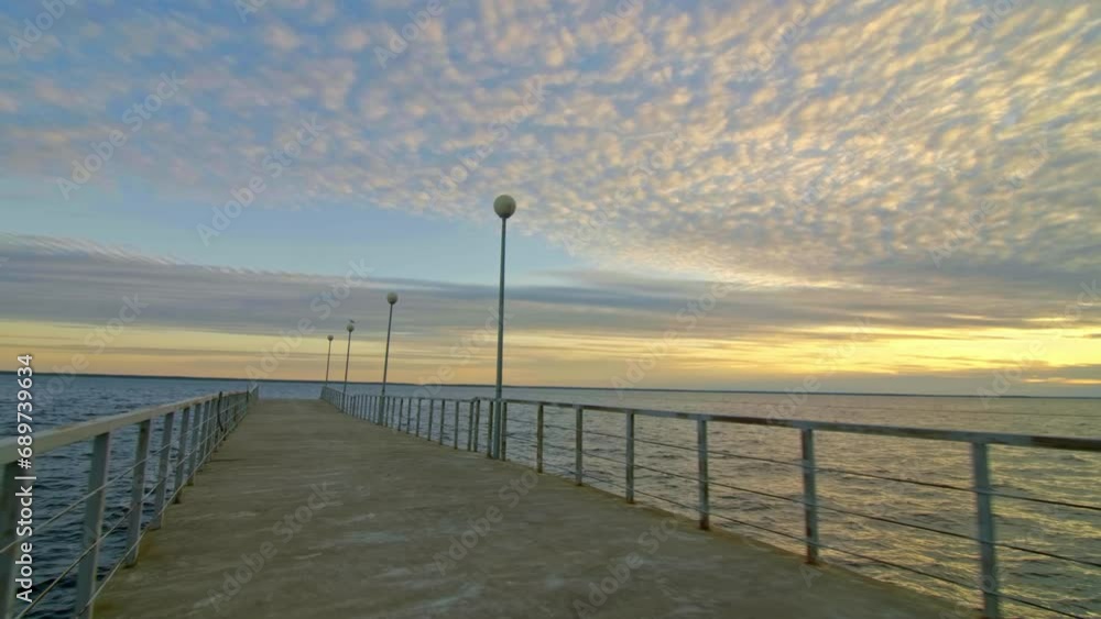 Lonely Pier Awaiting Nightfall, Sea, Sky, and Solitude Lonely Pier Awaiting Nightfall, Sea, Sky, and Solitude