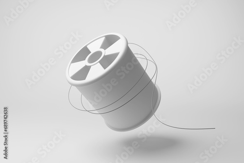 White cotton reel and a thread floating in mid air on white background. Illustration of the concept of stitching, embroidery and textile industry