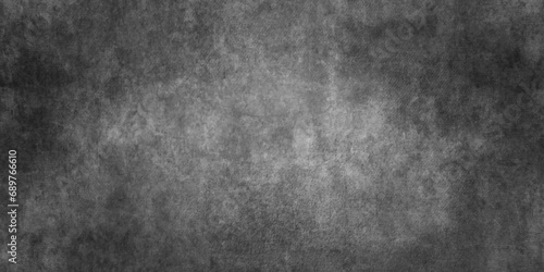 Abstract Granular black wall texture with scratches, panorama Dark grunge texture black wall, dusty blackboard or chalkboard texture, vintage distressed grunge texture with grainy stains and spots.