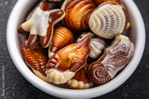 chocolate candy seashells sweet dessert appetizer meal food snack on the table copy space food background rustic top view