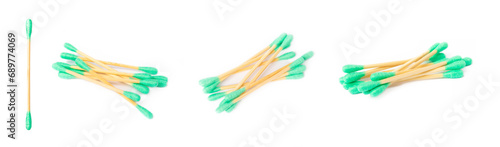 Cotton buds isolated on a white background. Environmentally friendly materials. Wooden  cotton swabs on a white background. Bamboo swabs and cotton flowers. Zero waste  plastic free lifestyle concept.