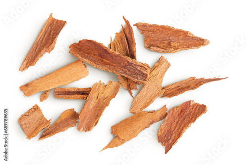 Cinnamon sticks crushed isolated on a white background. Top view. Flat lay.