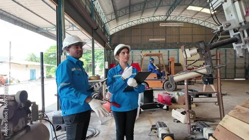 female male woman man person people human black skin south african american india country international person people human white hardhat helmet safety factory engineer robot control automation manage