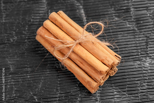 Cinnamon sticks tied with a natural string. Christmas ingredient