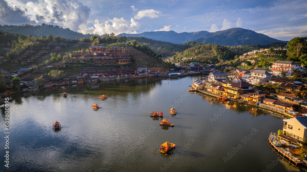 The Yunnan village on Thailand hill , RAK THAI , The most beautiful Yunnan house. and a lot of boat. on the river. with a minimal sun Landscape