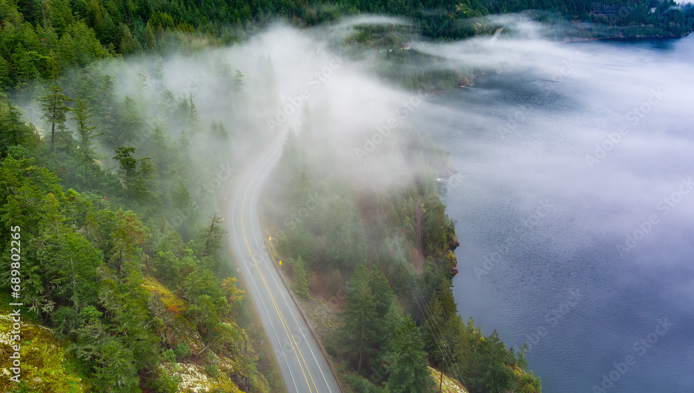 Sea to Sky Highway in Howe Sound. Aerial View Canadian Mountain Landscape on West Coast. Sea to Sky Highway in Howe Sound. Aerial View Canadian Mountain Landscape on West Coast.