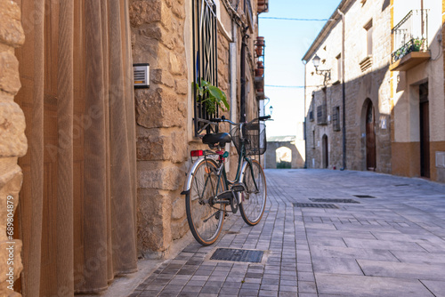 Sustainable mobility. Bicycle at the door of a town house. photo