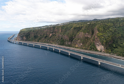 Wallpaper Mural Aerial view of the new and old coastal road Route du Littoral connecting Saint Denis with La Possession, Réunion. Torontodigital.ca