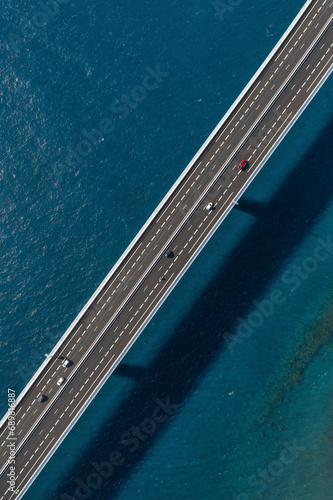 Aerial view of the new and old coastal road Route du Littoral connecting Saint Denis with La Possession, Réunion. photo