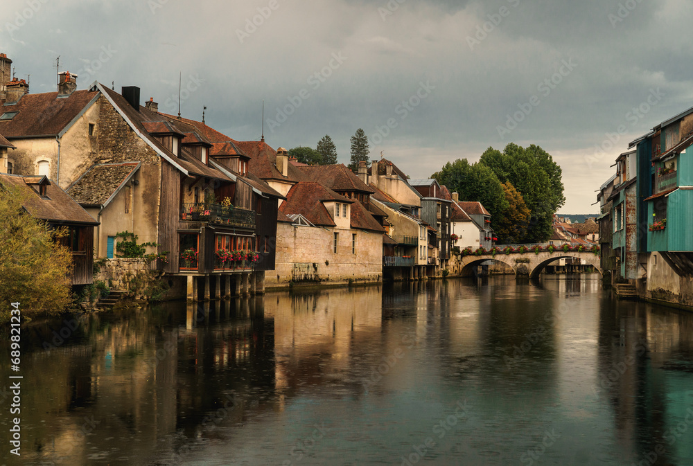 Village houses along river, Ornans, Doubs, Bourgogne-Franche-Comte, France