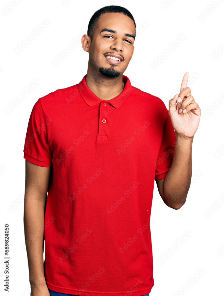 Young african american man wearing casual polo smiling with an idea or question pointing finger up with happy face, number one Young african american man wearing casual polo smiling with an idea or question pointing finger up with happy face, number one