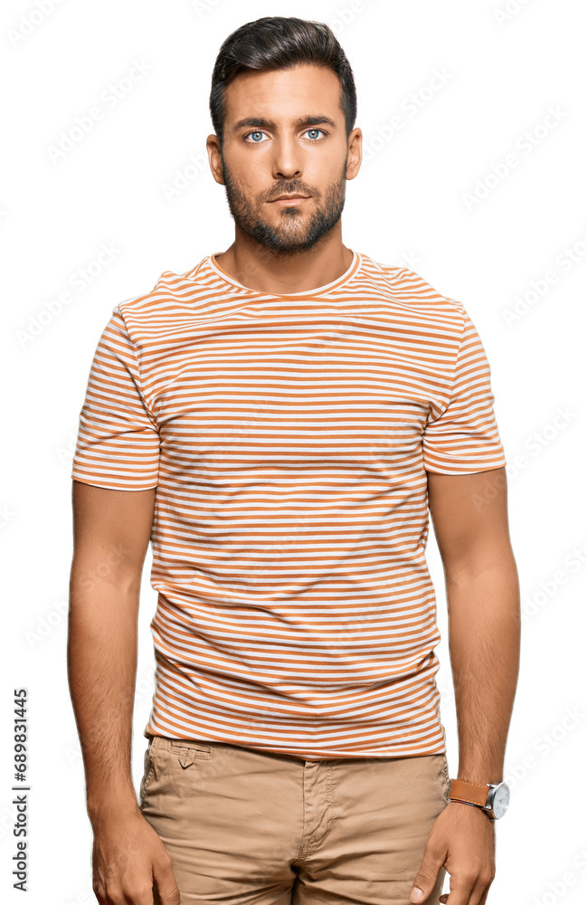 Fototapeta premium Handsome hispanic man wearing casual clothes relaxed with serious expression on face. simple and natural looking at the camera.