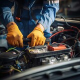 Technician Hands of car mechanic working repair in auto repair Service electric battery and Maintenance of car battery. Check the electrical system inside the car. - Generative AI