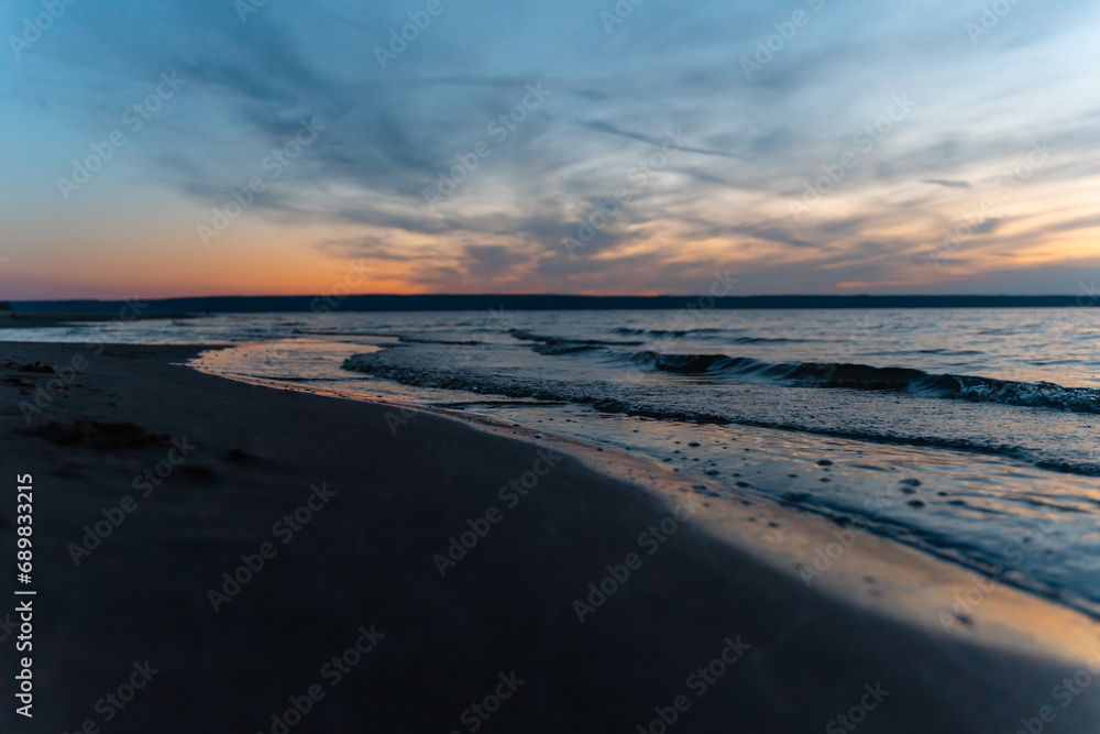 Sea waves at sunset, natural landscape
