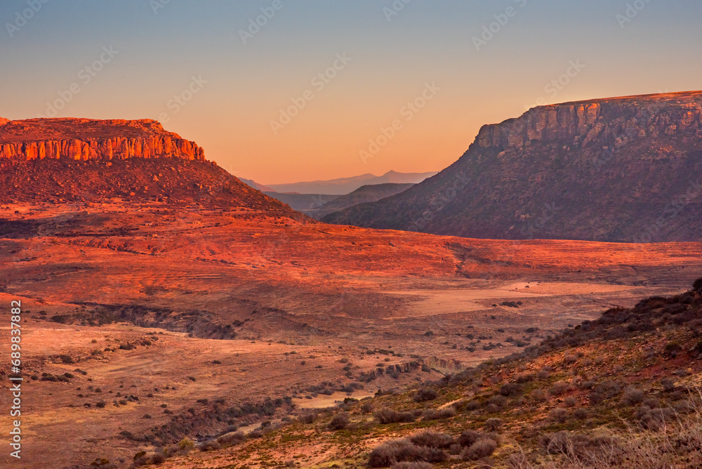 Rugged terrain and glowing mountains in a remote part of Lesotho, Africa