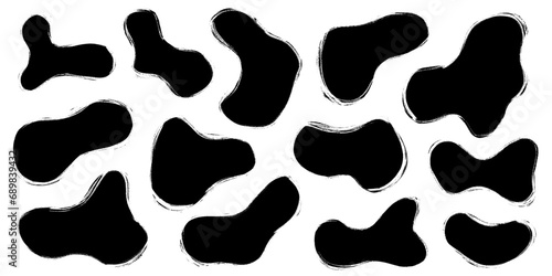 Organic grungy random irregular linocut shapes, abstract freeform liquid elements. Charcoal pencil scribble form smooth blobs, contemporary random stains. Vector illustration of black, round, uneven, 
