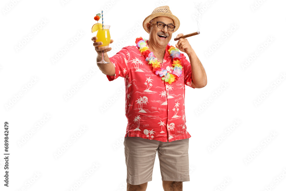 Happy mature male tourist smoking a cigar and holding a glass of coctail