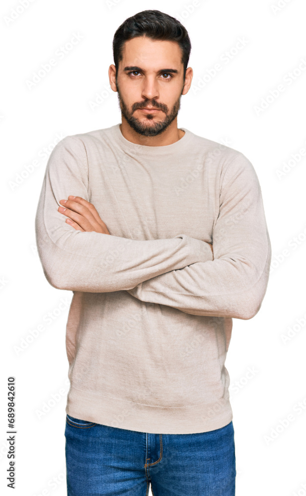 Fototapeta premium Young hispanic man wearing casual clothes skeptic and nervous, disapproving expression on face with crossed arms. negative person.