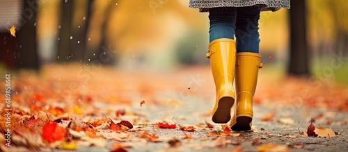 Autumn and winter lifestyle, with rain boots and an umbrella. photo