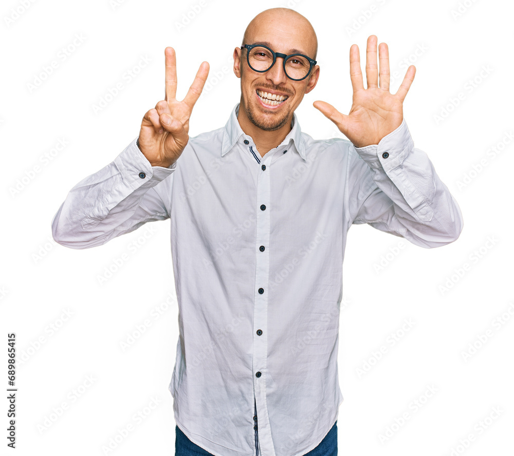 Bald man with beard wearing business shirt and glasses showing and pointing up with fingers number seven while smiling confident and happy. Bald man with beard wearing business shirt and glasses showing and pointing up with fingers number seven while smiling confident and happy.