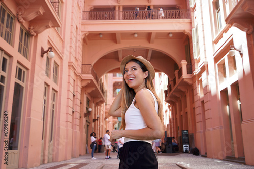 Portrait of young woman visiting the historic palace Casa de Cultura Mario Quintana in Porto Alegre, Brazil photo