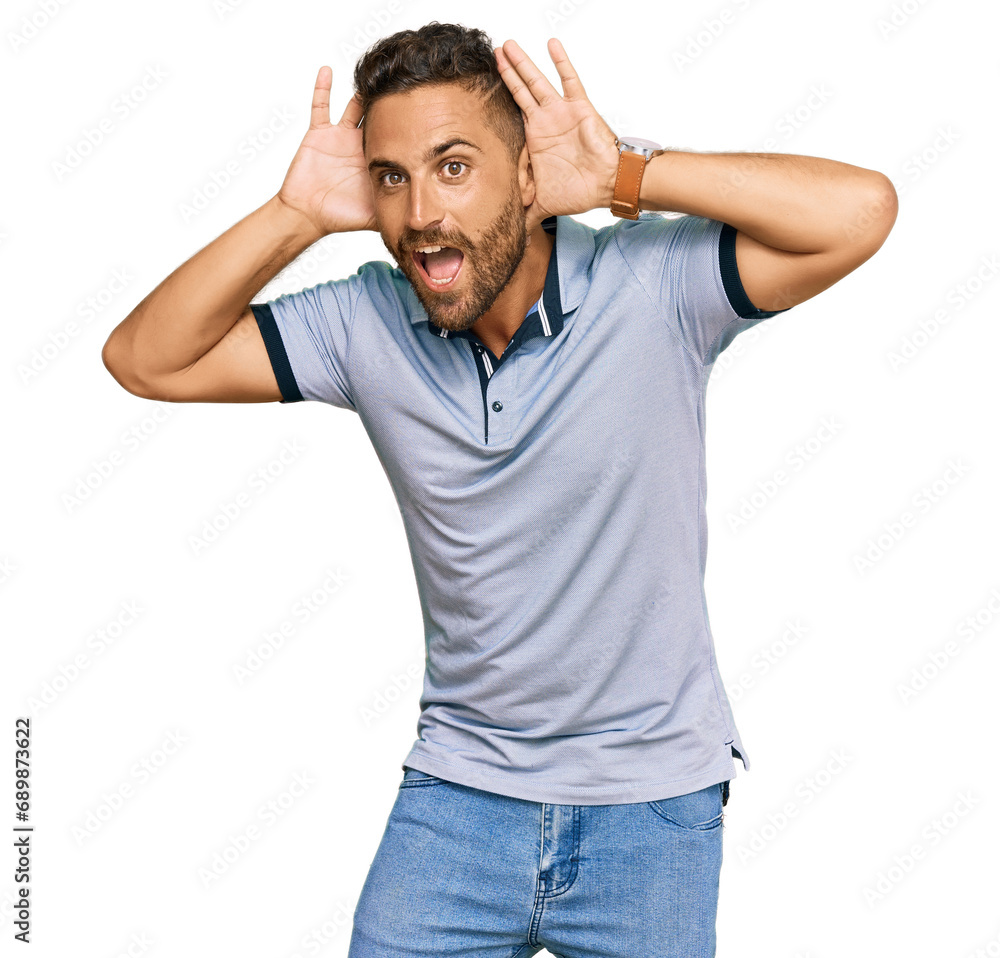 Handsome man with beard wearing casual clothes smiling cheerful playing peek a boo with hands showing face. surprised and exited Handsome man with beard wearing casual clothes smiling cheerful playing peek a boo with hands showing face. surprised and exited