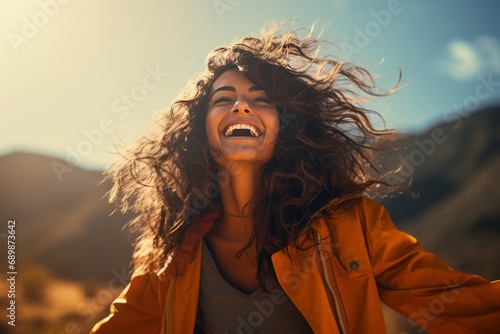 A beautiful smiling girl dressed in hippie style. A happy tourist in comfortable clothes traveling through a picturesque tropical country. The concept of travel, car tourism
