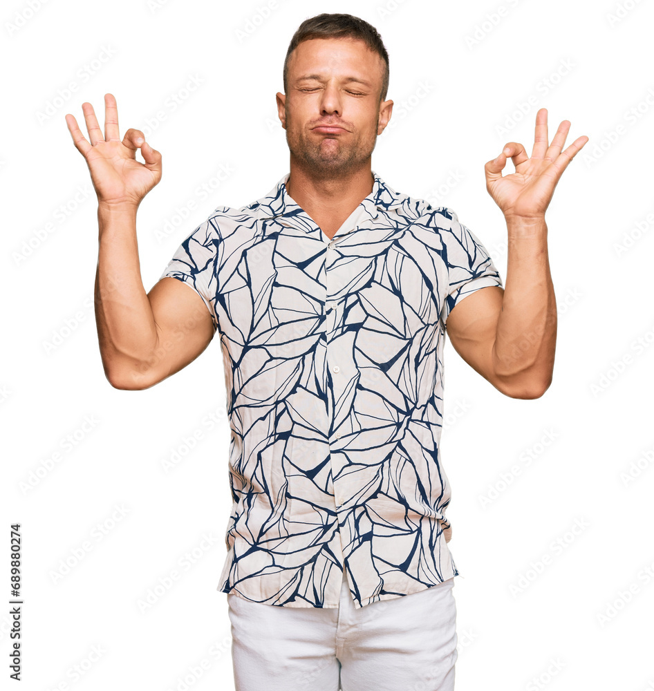 Naklejka premium Handsome muscle man wearing casual clothes relax and smiling with eyes closed doing meditation gesture with fingers. yoga concept.