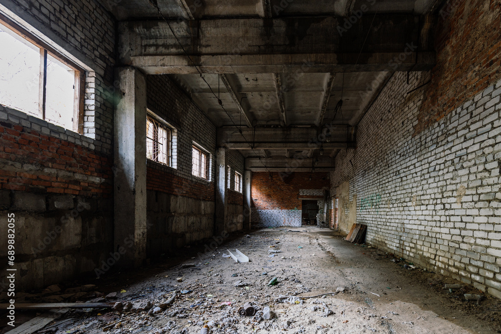 Old broken empty abandoned industrial building interior