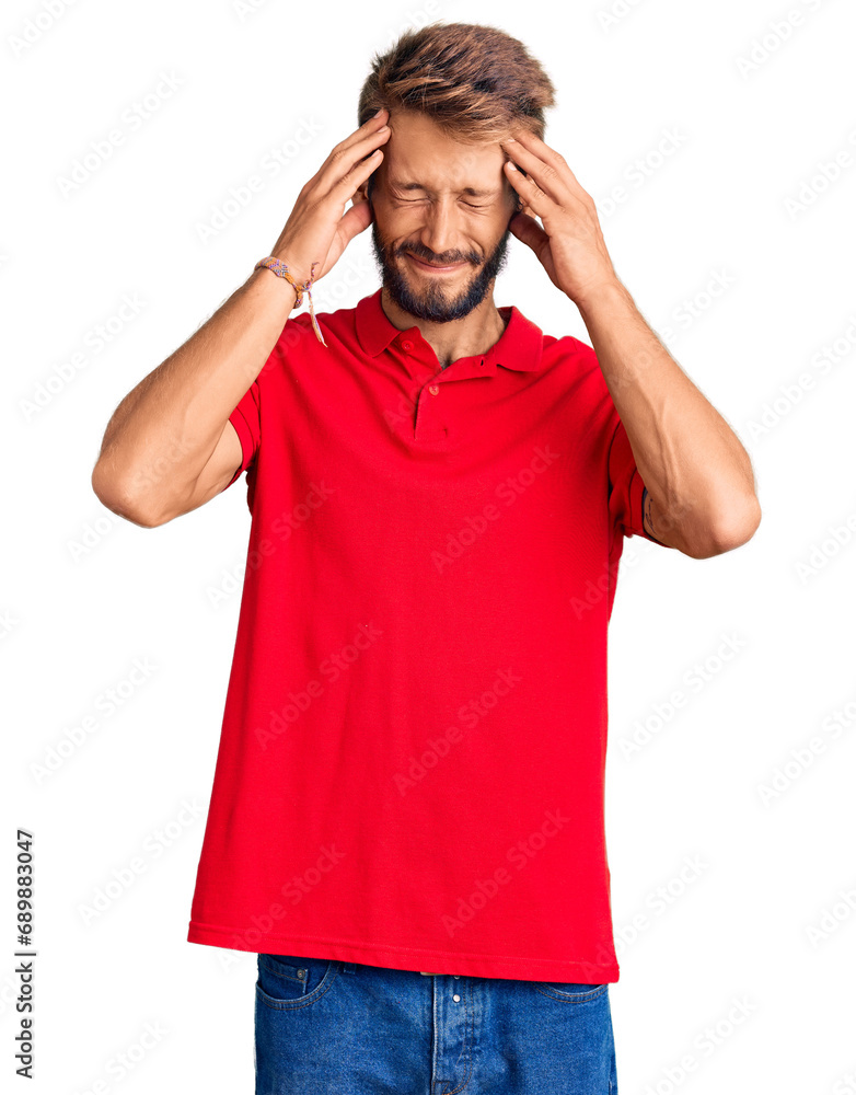 Handsome blond man with beard wearing casual clothes with hand on head for pain in head because stress. suffering migraine. Handsome blond man with beard wearing casual clothes with hand on head for pain in head because stress. suffering migraine.