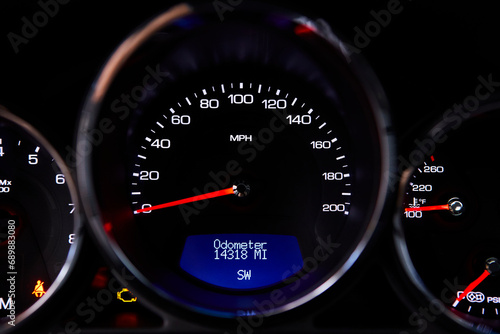 Dashboard of a modern sports car. Blue frame lights.