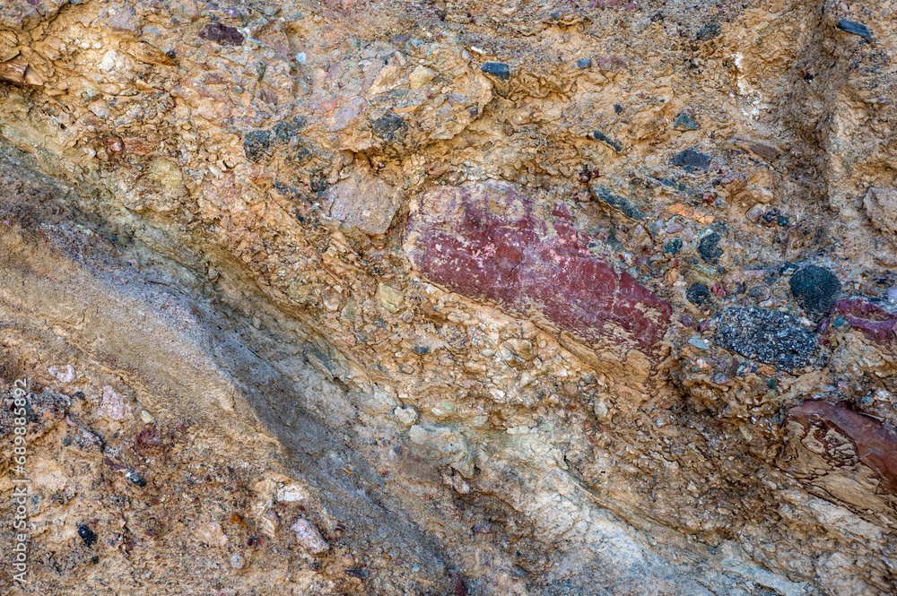 Obraz premium Formations of multicolored rocks, abstract design backgrounds, patterns, textures. Geology theme