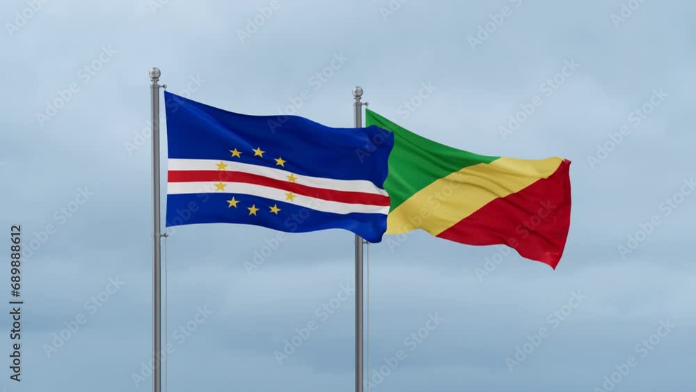 Republic of the Congo flag and Cape Verde flag waving together on cloudy sky, endless seamless loop, two country relations concept Republic of the Congo flag and Cape Verde flag waving together on cloudy sky, endless seamless loop, two country relations concept
