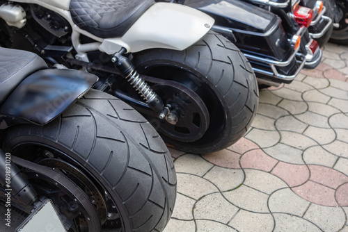 motorcycles with fat wheels parked together