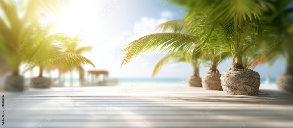 Obraz premium White sand beachside wooden terrace Blur tropical beach, bokeh sun and palm trees in coffee photo room