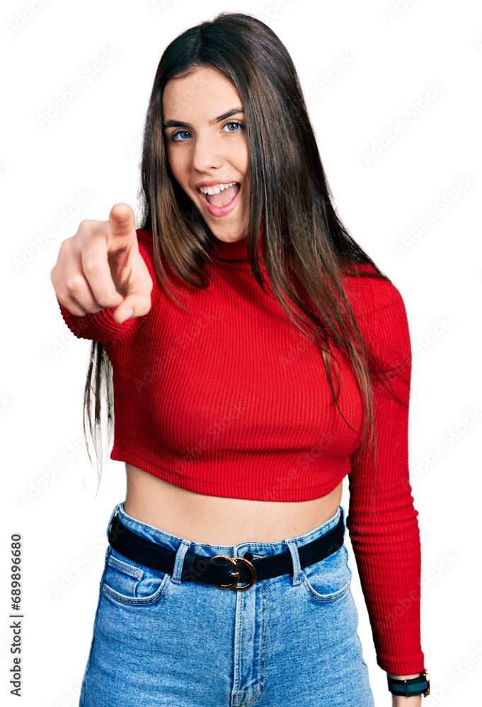 Φωτογραφία Young brunette teenager wearing red turtleneck sweater pointing displeased and f