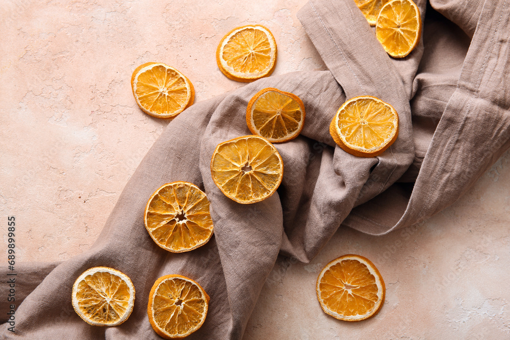 Dried orange slices on beige background Dried orange slices on beige background