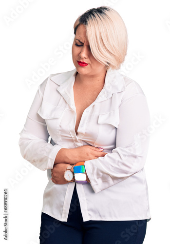 Young blonde plus size woman wearing casual shirt with hand on stomach because indigestion, painful illness feeling unwell. ache concept.