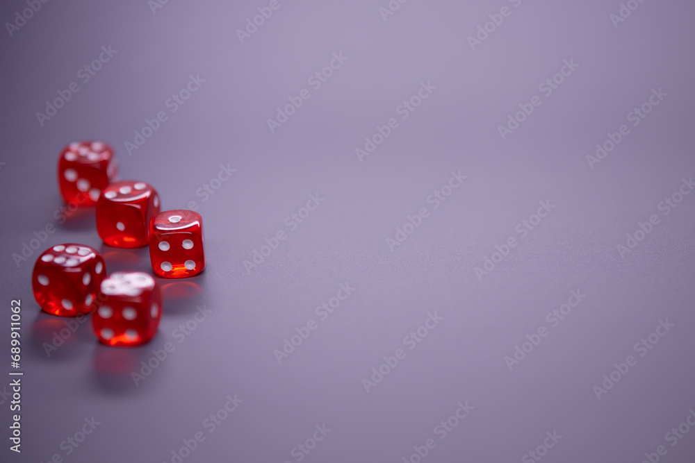 Red dices on grey background. Copy space. Red dices on grey background. Copy space.