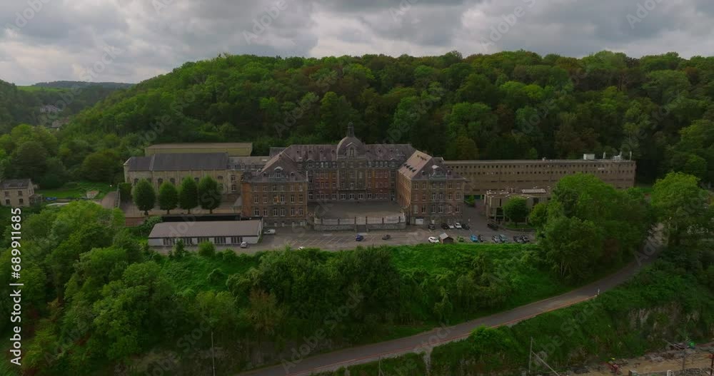 Establishing aerial shot of Dinant, Belgium drone cinematic video. Beautiful Belgian city on the river bank. Summer time in the tourist center of Dinant Establishing aerial shot of Dinant, Belgium drone cinematic video. Beautiful Belgian city on the river bank. Summer time in the tourist center of Dinant