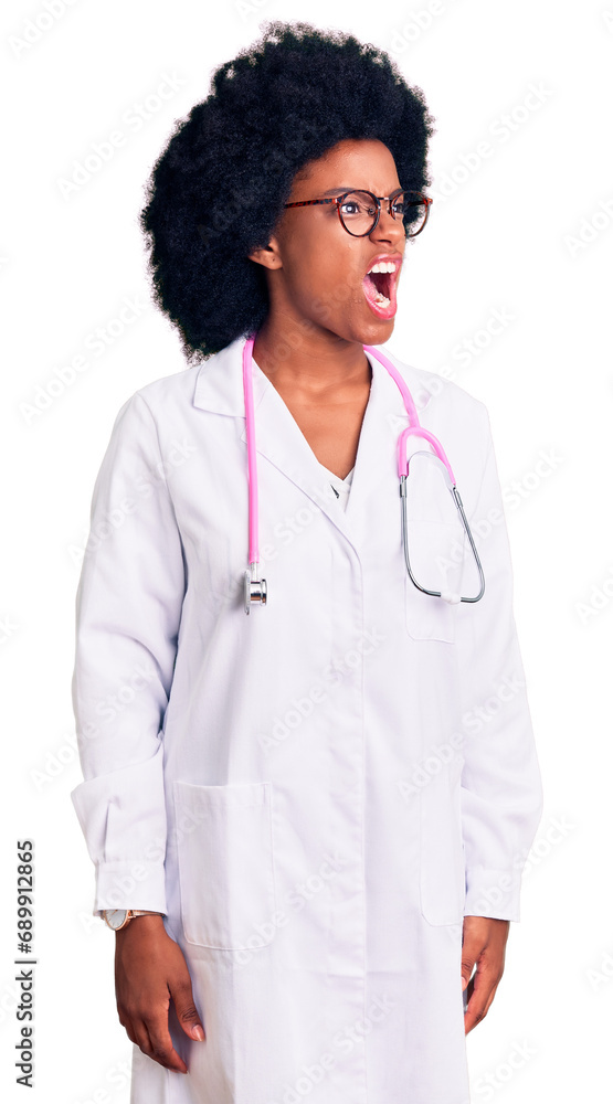 Young african american woman wearing doctor coat and stethoscope angry and mad screaming frustrated and furious, shouting with anger. rage and aggressive concept. Young african american woman wearing doctor coat and stethoscope angry and mad screaming frustrated and furious, shouting with anger. rage and aggressive concept.