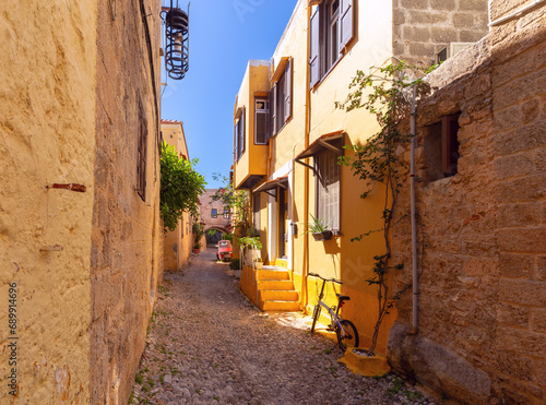 Fototapeta Naklejka Na Ścianę i Meble -  Old medieval street in the historical part of Rhodes.